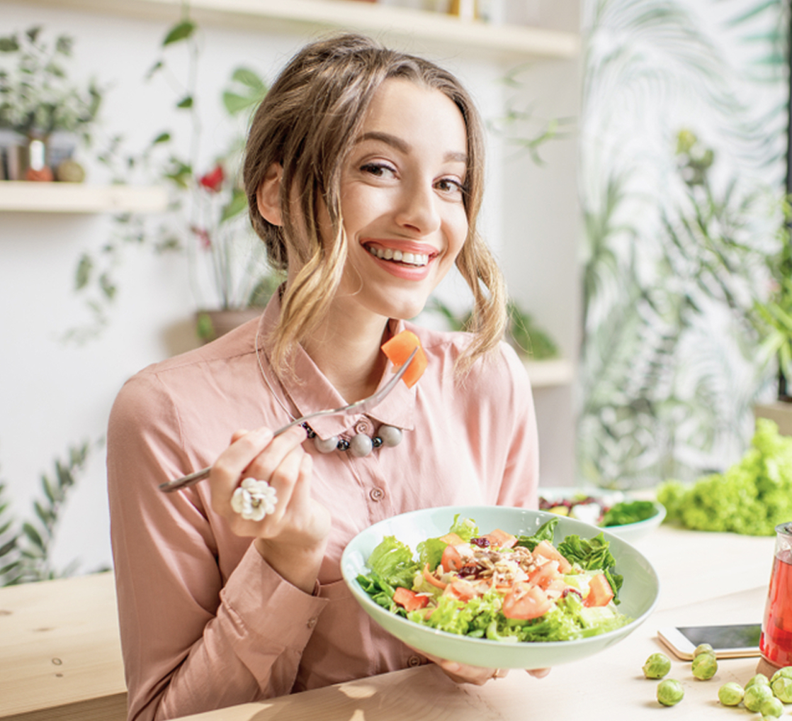 woman is eating food